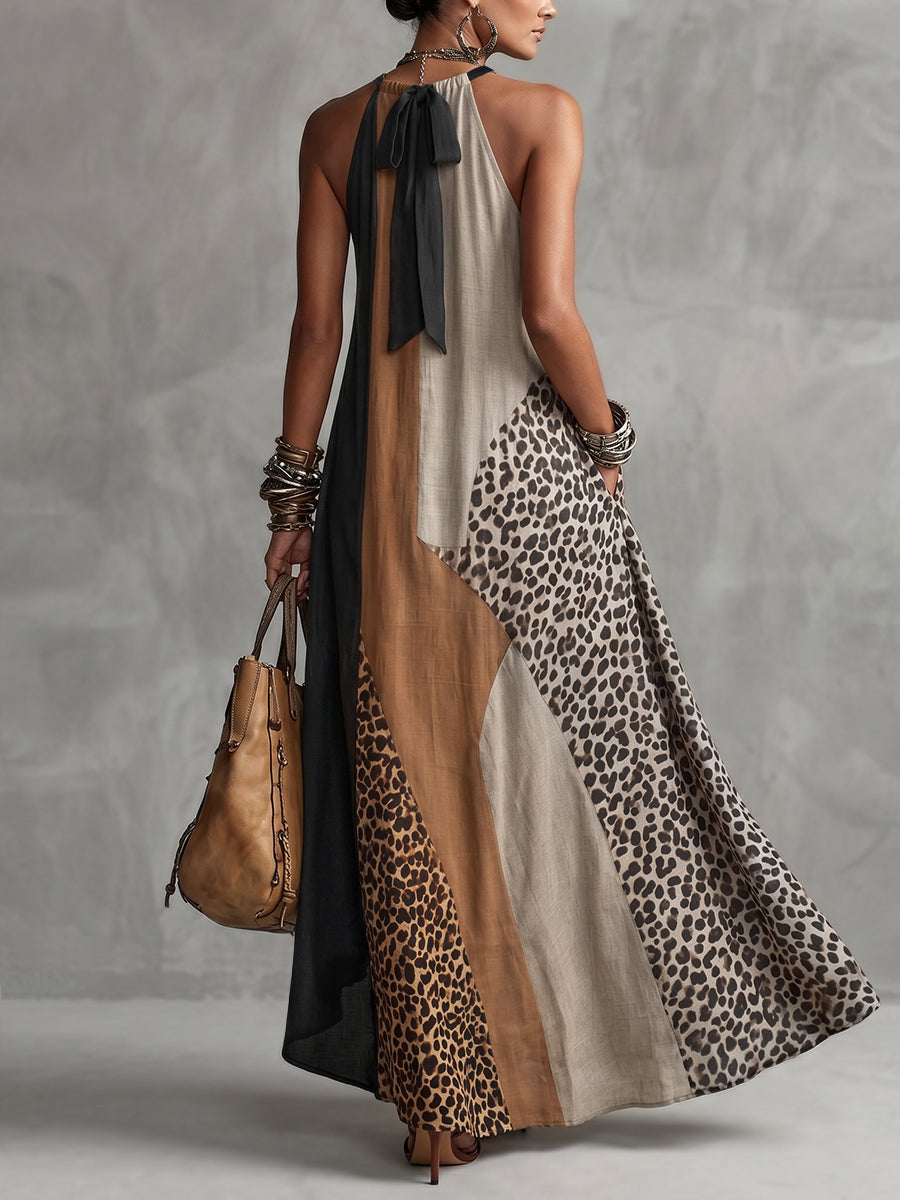 LUCIA | Vestido Maxi Frente Única com Estampado Leopardo e Painéis Assimétricos