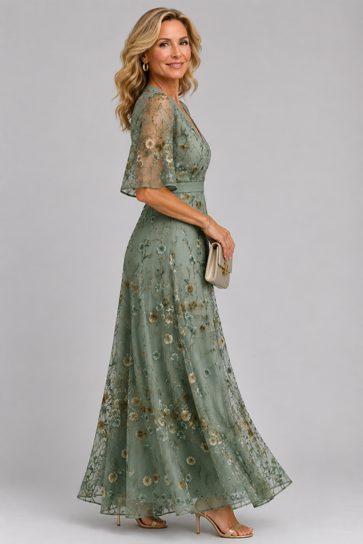 Solenne | Vestido midi floral com gola halter